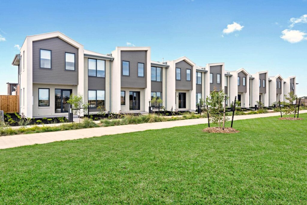 Row of modern newly built two-storey townhouses in a Melbourne estate